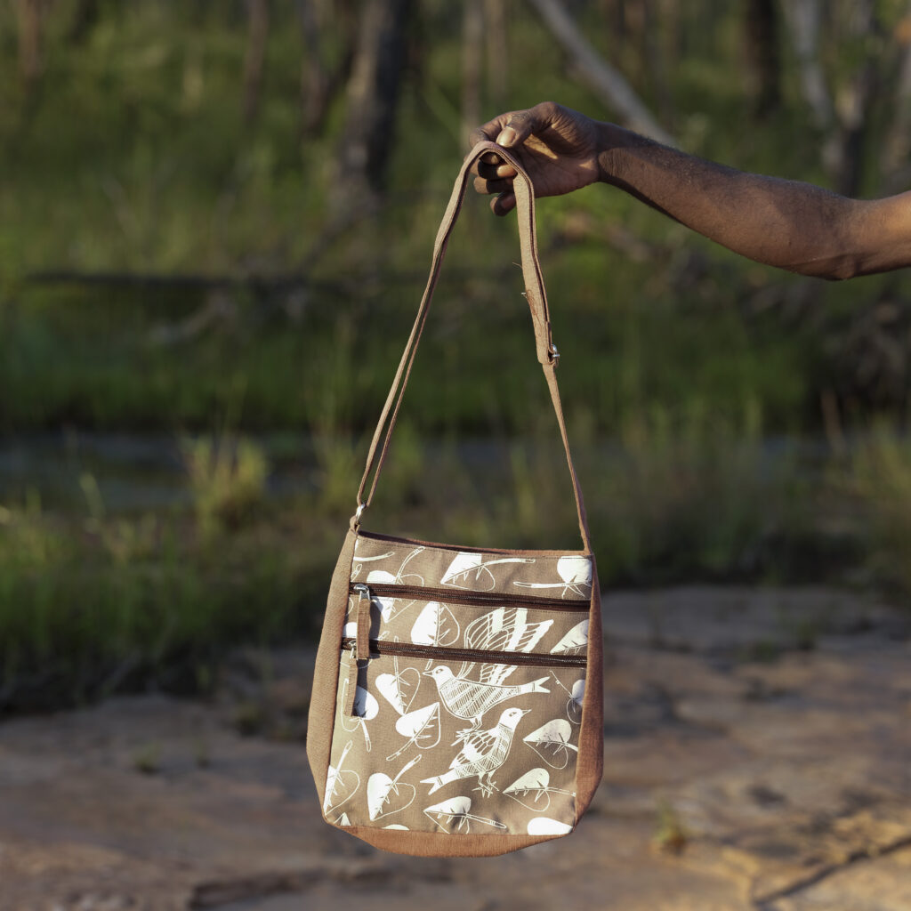 Lidjilidji (Crimson Finch)  Delia crossbody bag - Textiles - Designed by Andrew Wanamilil